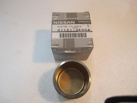 Поршень тормозного суппорта Nissan/Infiniti 41121JE00A (фото 1)