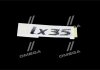 Эмблема надпись "IX35" Mobis (KIA/Hyundai) 863102S010 (фото 1)